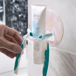 Veggmontert holder for tannbrster og tannkrem