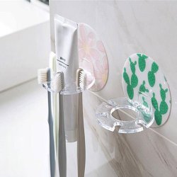 Veggmontert holder for tannbrster og tannkrem