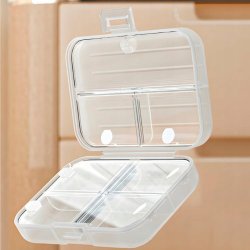 Kompakt pillerask med flera fack � perfekt �verblick i vardagen och p� resande fot