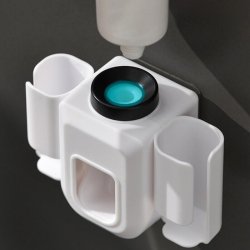 Halter f&uuml;r elektrische Zahnb&uuml;rsten + Zahnpastaspender